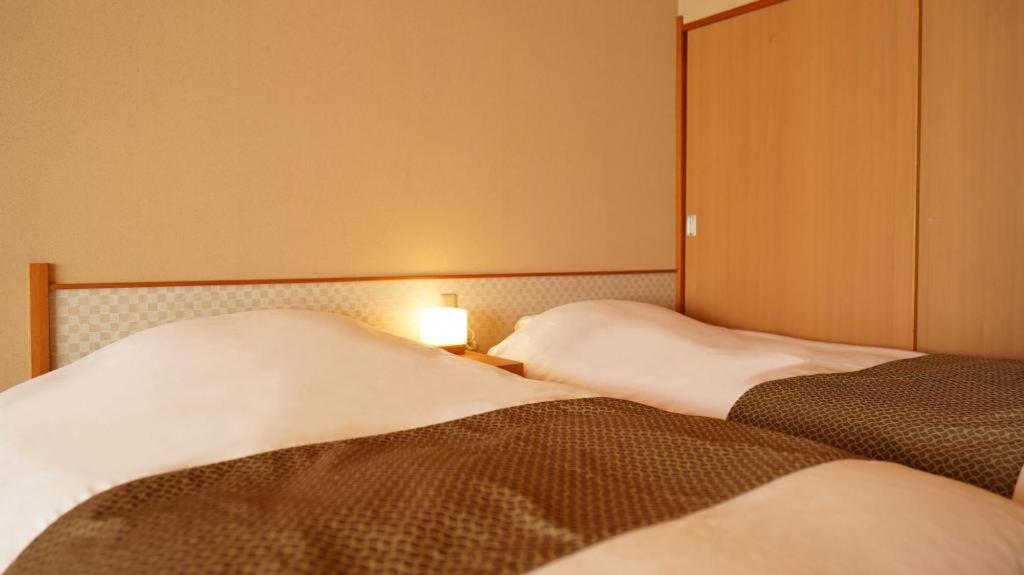 Tsukino Sumika Atami Juraku Hotel Esterno foto